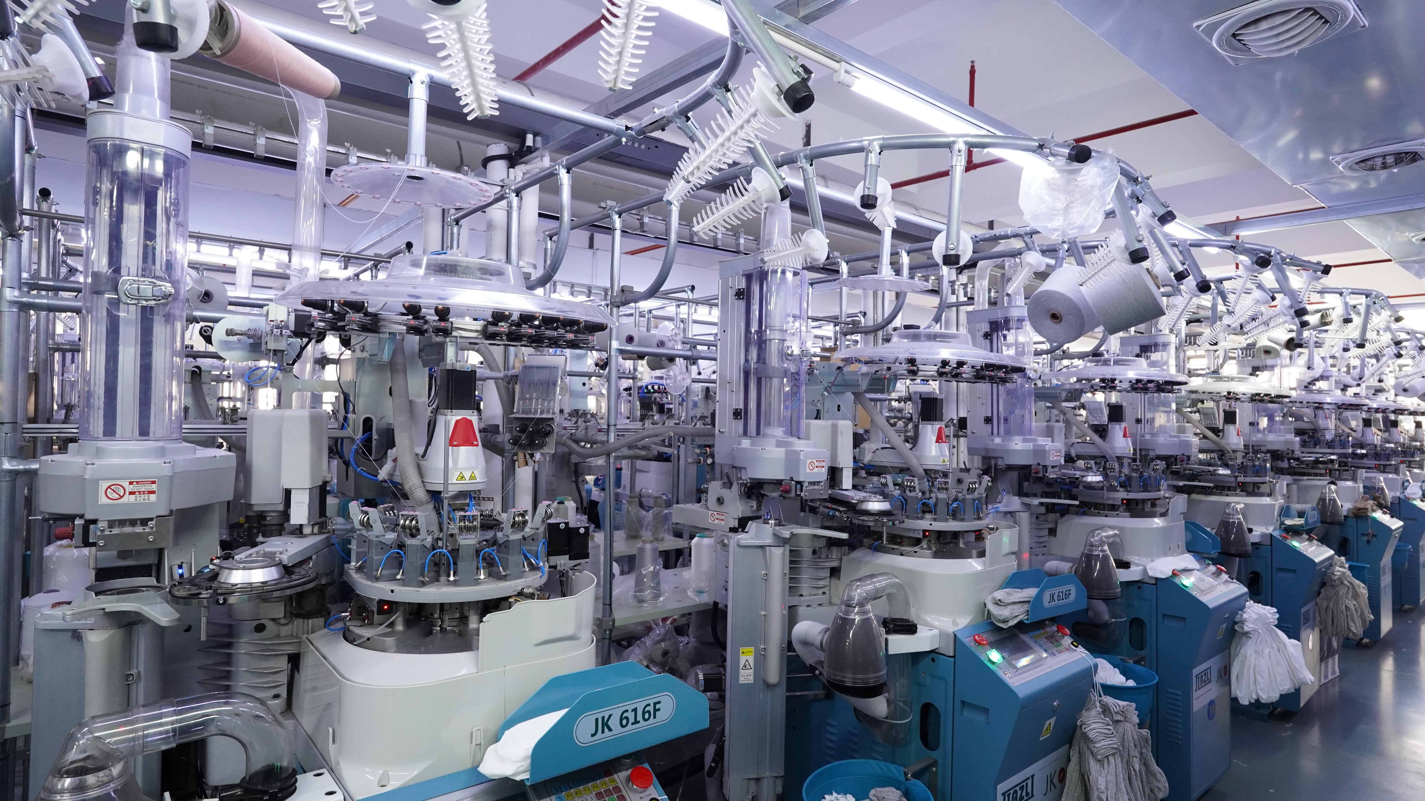 Modern sock knitting machines on the GoodStartSocks production floor